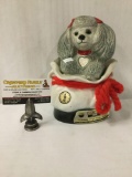 Vintage Jim Beam decanter In the shape of a poodle dog in a bag. heart shaped inscription that reads