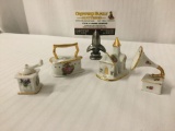 4 small Limoges Castel porcelain figurines from France - church, coffee grinder, iron and a