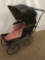 Antique mid 1800's gothic baby carriage with adjustable leather/vinyl canopy - good cond