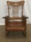 Antique tiger oak Americana rocking chair with sloped seat & stick/ball back as is