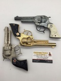 3 Hubley Texan Jr. Cap Gun revolver pistols incl. rare gold model - see pics and desc