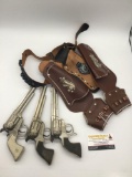 Collection of 3 Schmidt Buckin Bronc cap gun revolver pistols incl. leather holster - 1 working