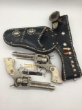 Pair of 40's Hubley Texan cap gun revolvers pistols (one with barrel chip) & black double leather