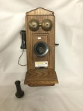 Vintage T.D.Y. Telephone Company hand crank type wood wall phone with dial, phone line, and extra