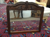 Antique Americana style vintage mirror with ornate carved top - small chip in left corner