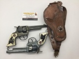 Pair of vintage 50s Hubley cowboy Jr die cast cap gun pistols w/ Western Ranger holster - working