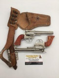 Pair of 50s Hubley Rodeo cap gun revolver pistols w/ bakelite handles, both tested & working