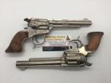 Pair of vintage Buckin Bronc BB-Cowhand die cast metal cap run revolver pistols - rare models as is