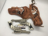 Pair of vintage Hubley Texan Jr die cast cap gun revolver pistols with double holster -