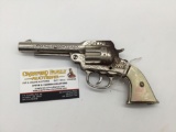 Vintage 40s Hubley Wandotte Peace Maker revolver cap gun with white cowboy and hose head handle