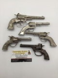 5 vintage Hubley cap gun pistols made from 1920-60's incl. 2 pals, Zip, Cop, & Star - as is