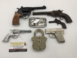 7 rare cap gun pistols incl. antique unmarked die cast pistol, America cast iron pistol, Hubley,