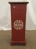 Thin red Asian end table with cabinet & painted Chinese symbol on front & back