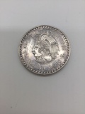 1948 90% silver Mexican 5 peso coin featuring King Cuauhtemoc. It weighs 30 grams