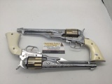 Pair of vintage Hubley Colt 45 metal cap gun revolver pistols.