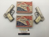 Pair of vintage 1940s Stevens Spit Fire war time cast iron 50 shot repeating toy pistol cap gun w/