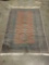 Vintage neutral tone geometric design rug with red/orange design - some light fringe staining