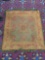 Antique floral motif Victorian rug with tassel - classic gold and red design - as is