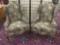 Pair of vintage wingback arm chairs with dark floral upholstery