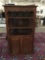 Antique early American corner cabinet hutch with glass door