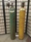 Two vintage oxygen tanks from Airgas and Industrial Air Products