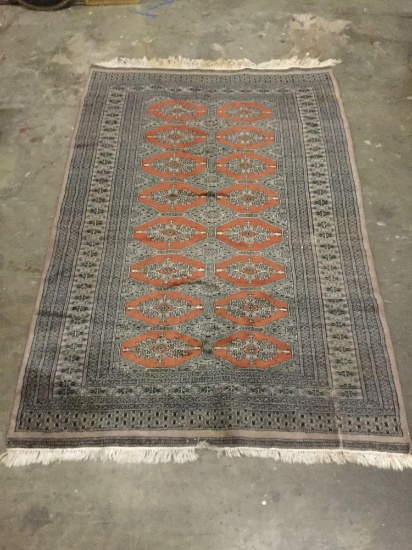 Vintage neutral tone geometric design rug with red/orange design - some light fringe staining