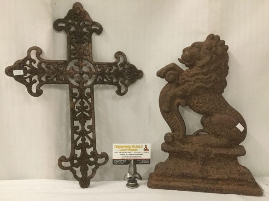 Antique cast iron lion decoration door stop and scroll work iron cross decoration