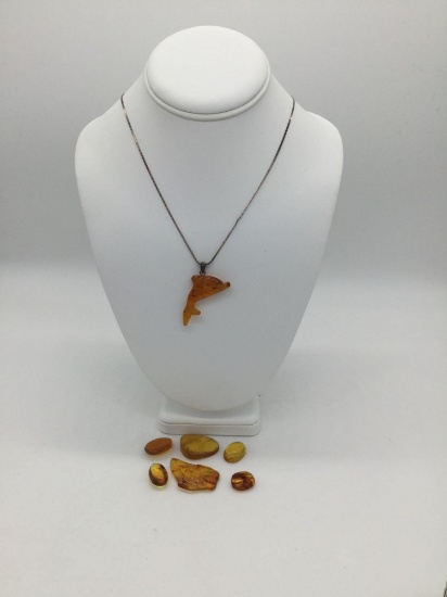 Collection of fossilized Baltic amber nuggets incl. 3 w/ inclusions & dolphin pendant on sterling