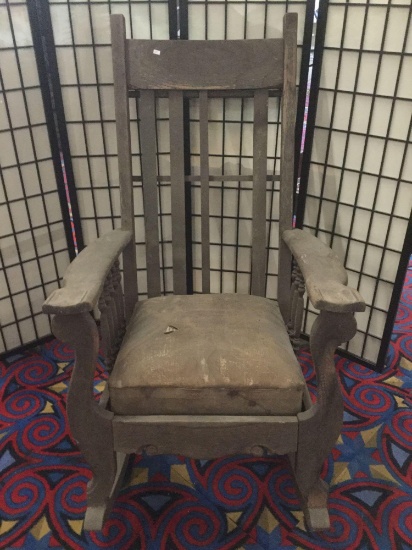 Antique wooden oversized rocking chair with some age wear - see pics