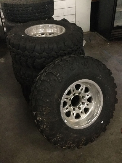 Set of 4 Irok Suler Swamper 36x13.5OR17LT tires with 18.5 inch Weld Racing rims - Nice!