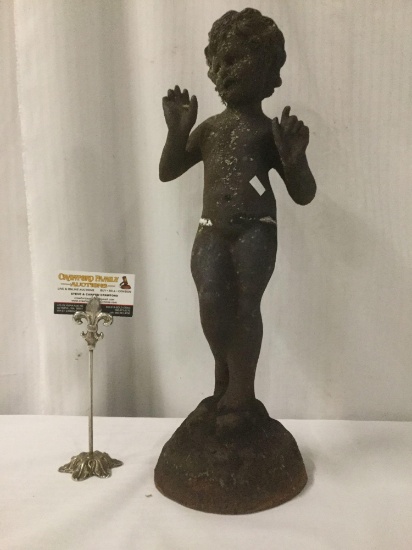 Antique cast metal statue of a pensive child - partly covered in moss - nice piece