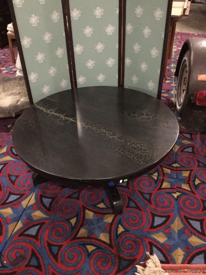 Modern antique inspired black coffee table with low profile and age crackle pattern
