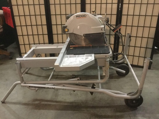 Rigid table saw No. BK091401213, attached to a wheeled cart. Tested and working