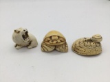 3 vintage netsuke figures incl. snail on clam, a fierce hippo (both signed) & a crab on clam shell