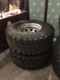 Pair of On/Off road 4 wheel PVT 6 ply rating tires and hubcaps