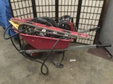 Red wheelbarrow full of tools and garage items inc. PSX2 Power station, levels and more see pics