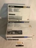 2 Clarion car stereo components in boxes - Clarion... Alpha RAX341D Clarion & ProAudio CDC635