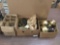 Large collection of oil lamp parts. Largest box measures approx 19x16x10 inches.