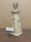 Clay statue of woman signed by artist Joy. Measures approx 16x10x8 inches.