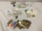 International vintage coins and U.S. stamps, approx. 8x11x3 inches.