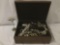 Vintage flatware box filled with Community silverware and some costume jewelry, approx. 16x11x6.5