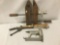 Three vintage tools, incl. a Senco nail gun, a clamp, and a clay pigeon thrower (?), approx. 22x13x3
