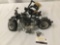 Pair of motorcycle themed wood and metal sculptures. The largest measures approx 16x10x4 inches.