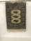 Hanging Eastern rug with geometric pattern with hanging bar