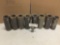 Collection of 8 dictaphone and Edison ediphone Master was cylinders for recording.