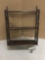 Vintage hanging wall shelf spice rack. Measures approx 25x17x6 inches.