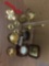 Collection of brass pieces, NNSA award, karafe, candle holders and more.