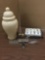 Collection of home decor items. Silverplate salt and pepper shakers, glass swan, and ceramic jar.