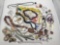 Large collection of costume jewelry. Shells, watch, hand painted and more.