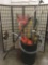 Trash can filled with 15 shovels, axes, a weed whacker (tested&working), & more, approx. 86x50x33